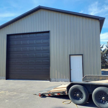 Brown and tan shop built by Wes Crezee Construction in East Idaho. 