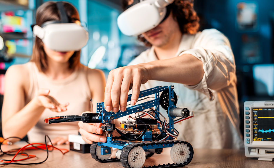 young-man-woman-vr-glasses-doing-experiments-robotics-laboratory-robot-tools (1).jpg
