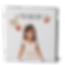 Smiling child in white dress on a book cover with Hebrew text and pomegranate illustrations on a white background.