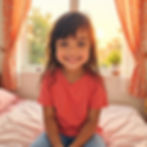 Smiling child in a pink shirt sits on a bed by a sunny window. Orange floral curtains and a potted plant create a warm atmosphere.