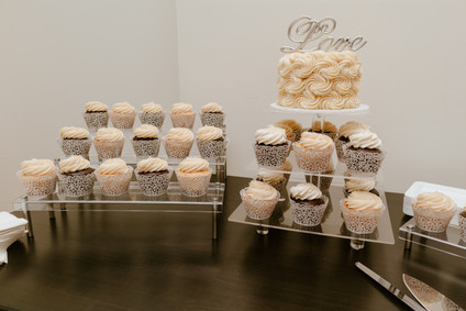wedding cake and cupcakes