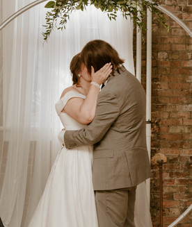 micro-wedding minneapolis minnesota couple first kiss