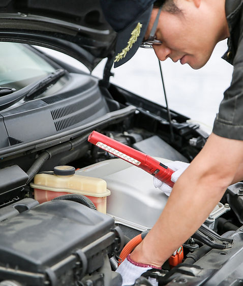 Mechanic Repairing Car_edited.jpg