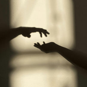 What is a Spirit Communication deck? two human hands reaching for one another.