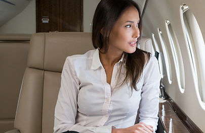 Woman in first class on an airplane