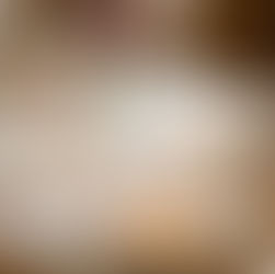 Bioland-Honig als Gastgeschenk mit Schleifenband und Honiglöffel