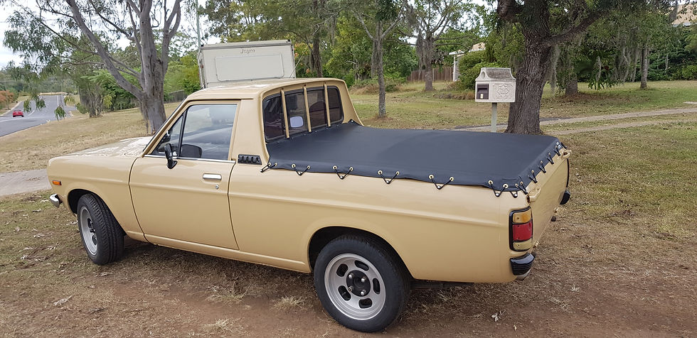 Beige ute with custom canvas tonneau