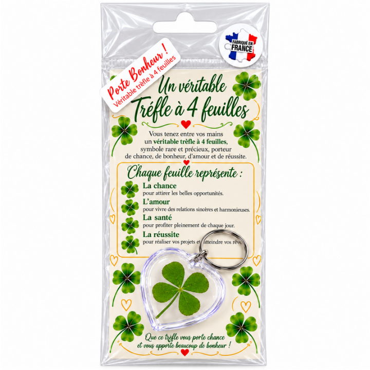 Porte-clés cœur transparent avec véritable trèfle à 4 feuilles, en sachet cadeau.
