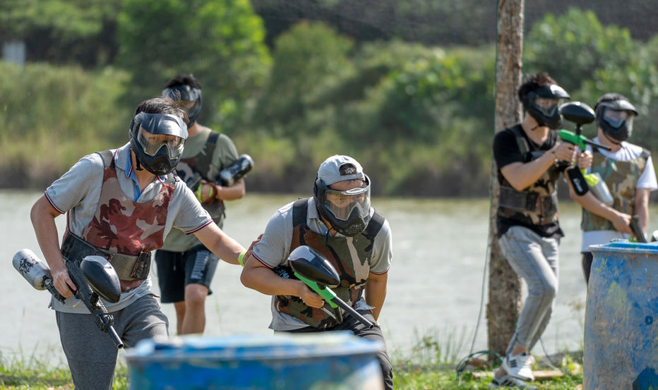 Cross-border paintball team building near SG improving group communication and team energy.