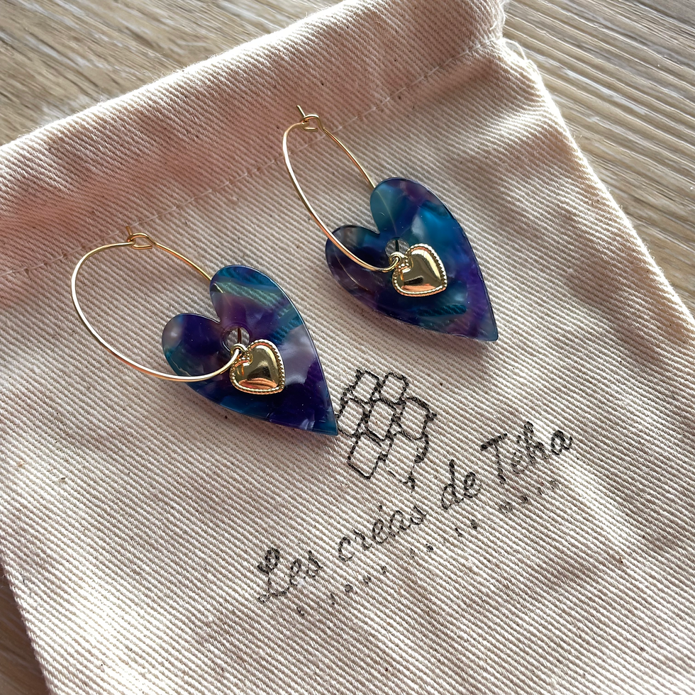 créoles en acier inoxydable et breloques coeurs par Les créas de Téha