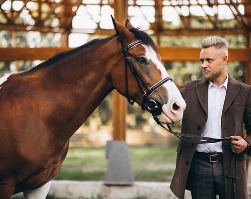 handsome-man-suit-ranch-by-horse.jpg