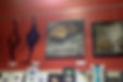 C15 art show hung above the art supply shelves