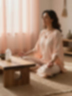 A client enjoys a relaxing guided meditation in a quiet room lit with soft candles, creating a warm, peaceful glow. Gentle guidance, slow breathing, and soothing stillness help release stress, calm the nervous system, and support emotional healing. This tranquil setting is ideal for mindfulness, spiritual connection, and deep inner rest, perfect for anyone seeking a safe, nurturing space to unwind and restore balance.
