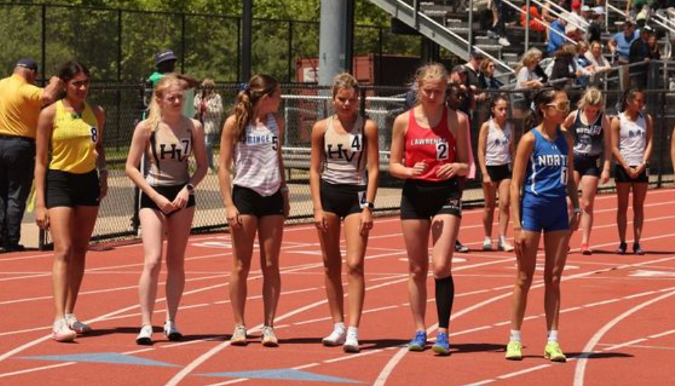The start of the girls 3200 won by Allison Lee of WW North.
