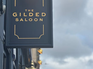 The Gilded Saloon Edinburgh review: pre-chuckle plates above The Gilded Balloon