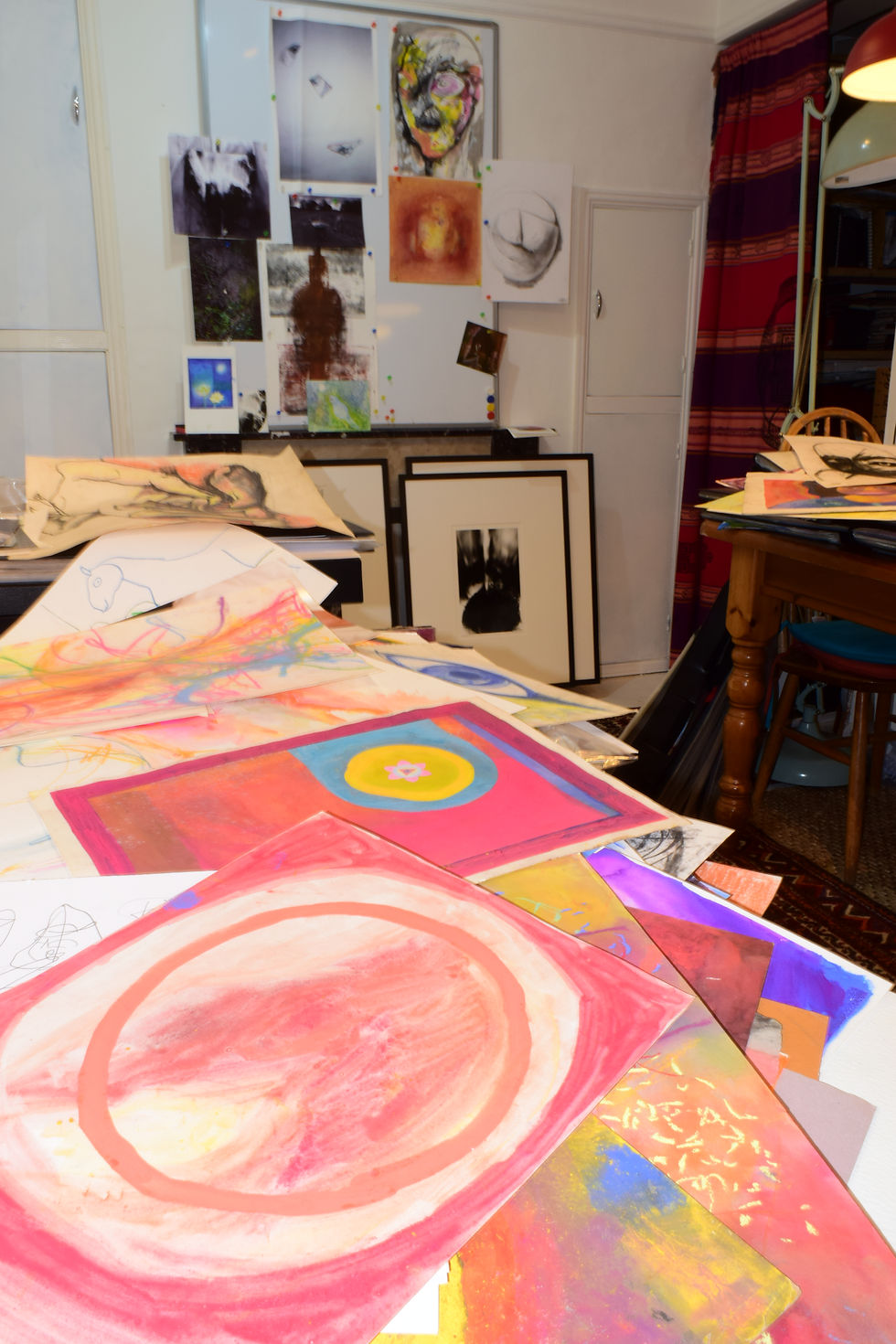 This photo shows early stages of sorting sketchbooks, studies, photos, and other art work made over 40 years. Stored in difficult-to-view polyholdalls, I threw out some work, and organised retained work into accessible display books