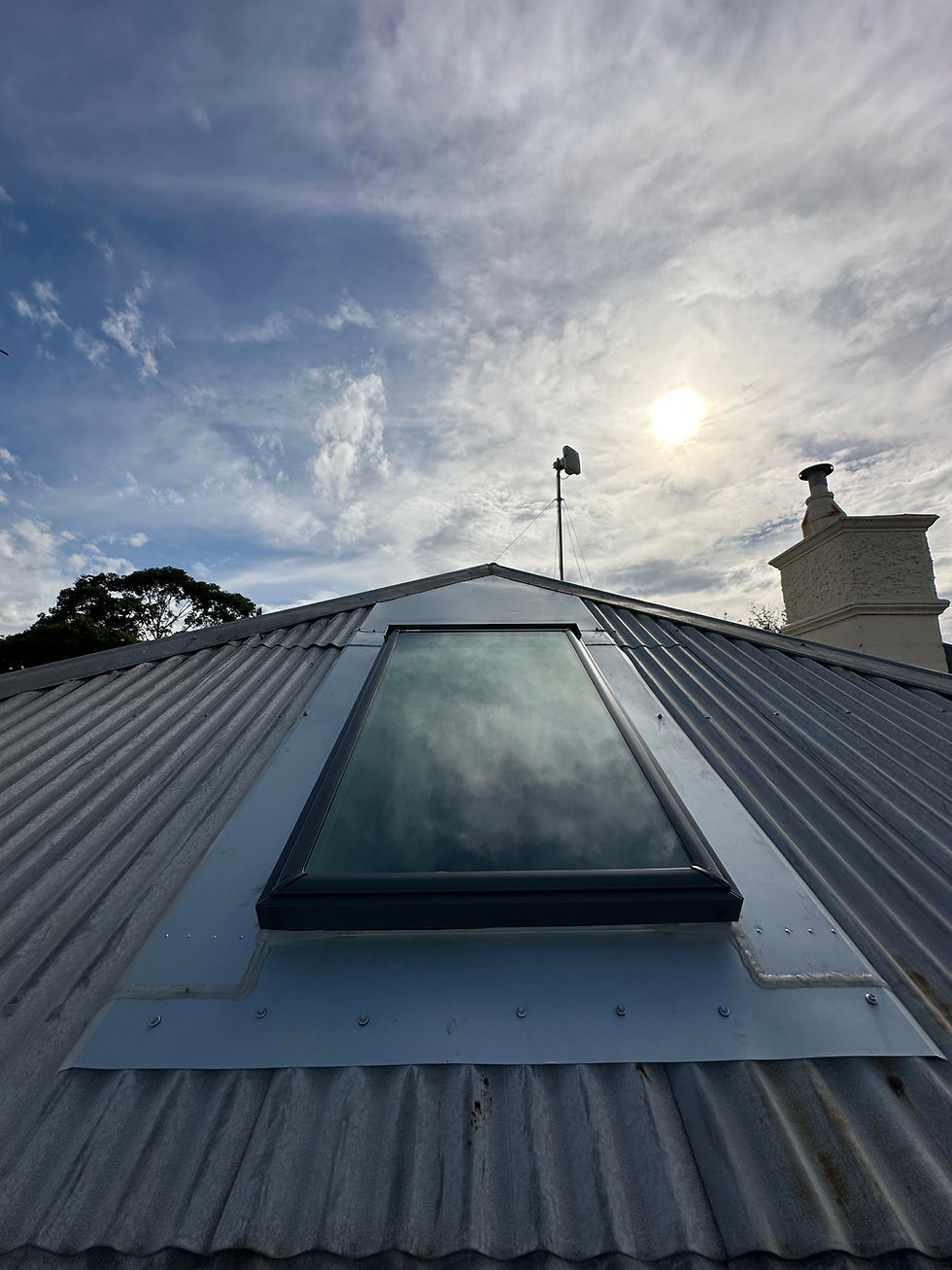 Velux Skylight Installation on Metal roof, custom flashing and back flahsing.