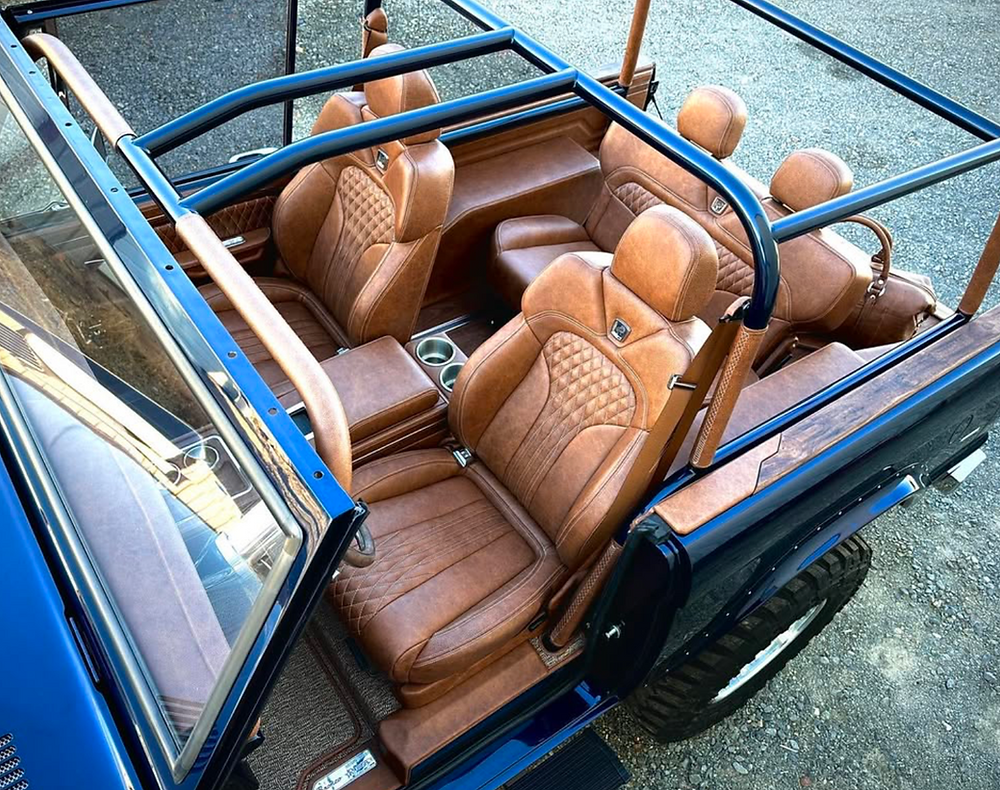Custom brown leather interior of a 1977 Bronco