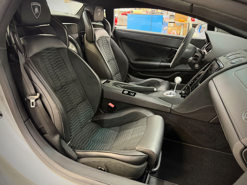 Black leather interior of a 2004 Lamborghini Gallardo