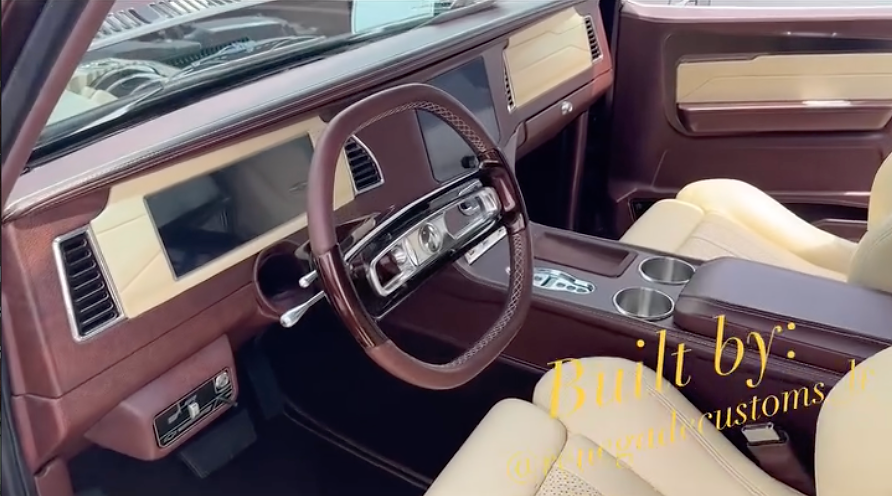 Custom wood and beige interior of a 1977 Blazer, built by @trevorcustoms