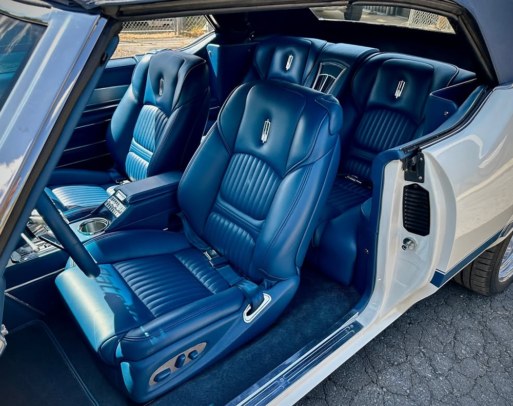 Close-up of handcrafted automotive upholstery stitching