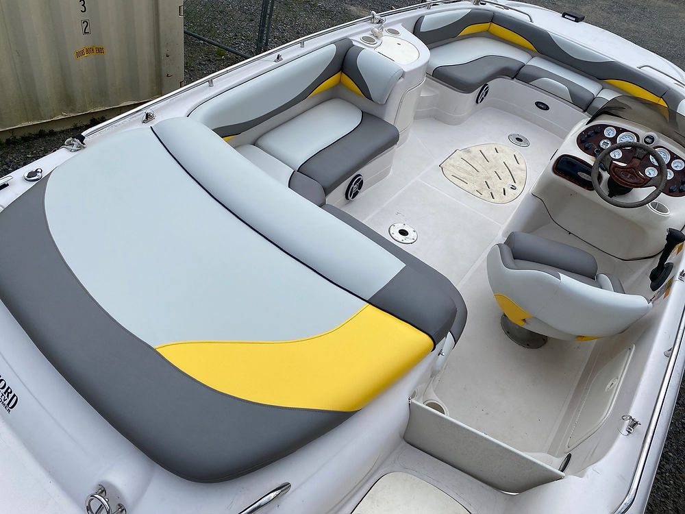 Marine boat interior, gray and yellow seating