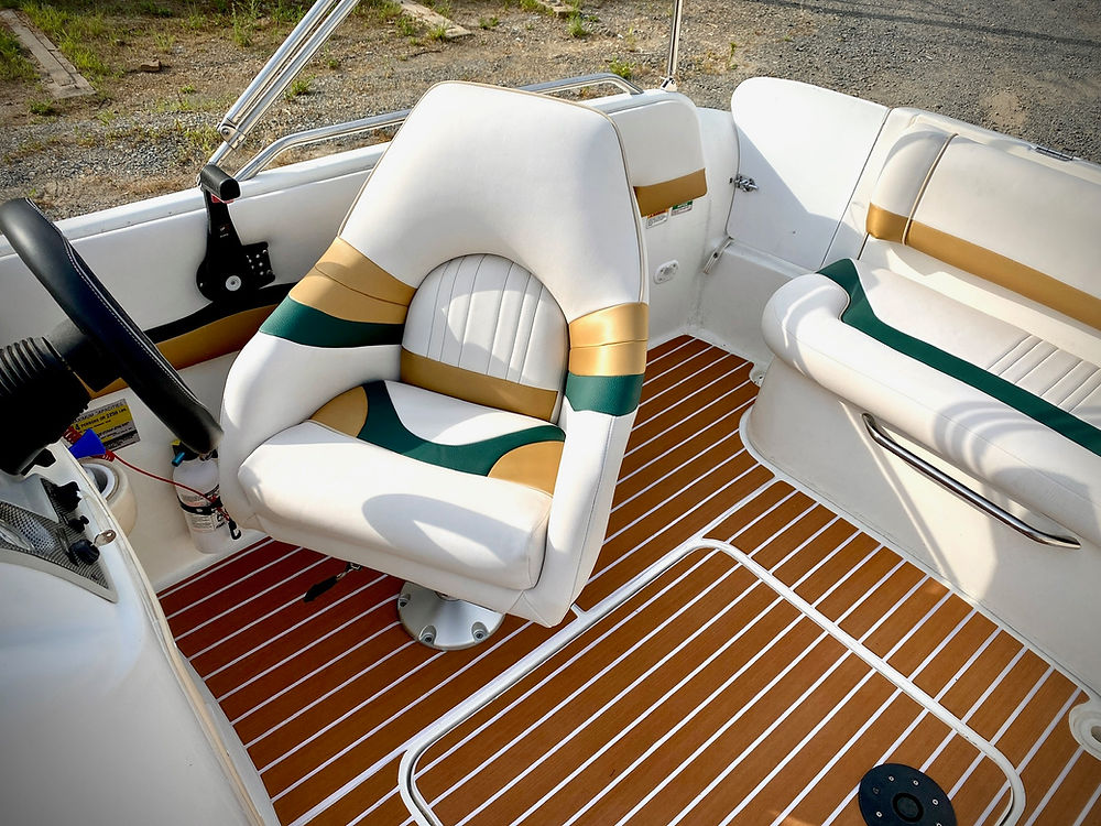 Marine boat interior with patterned flooring and seats