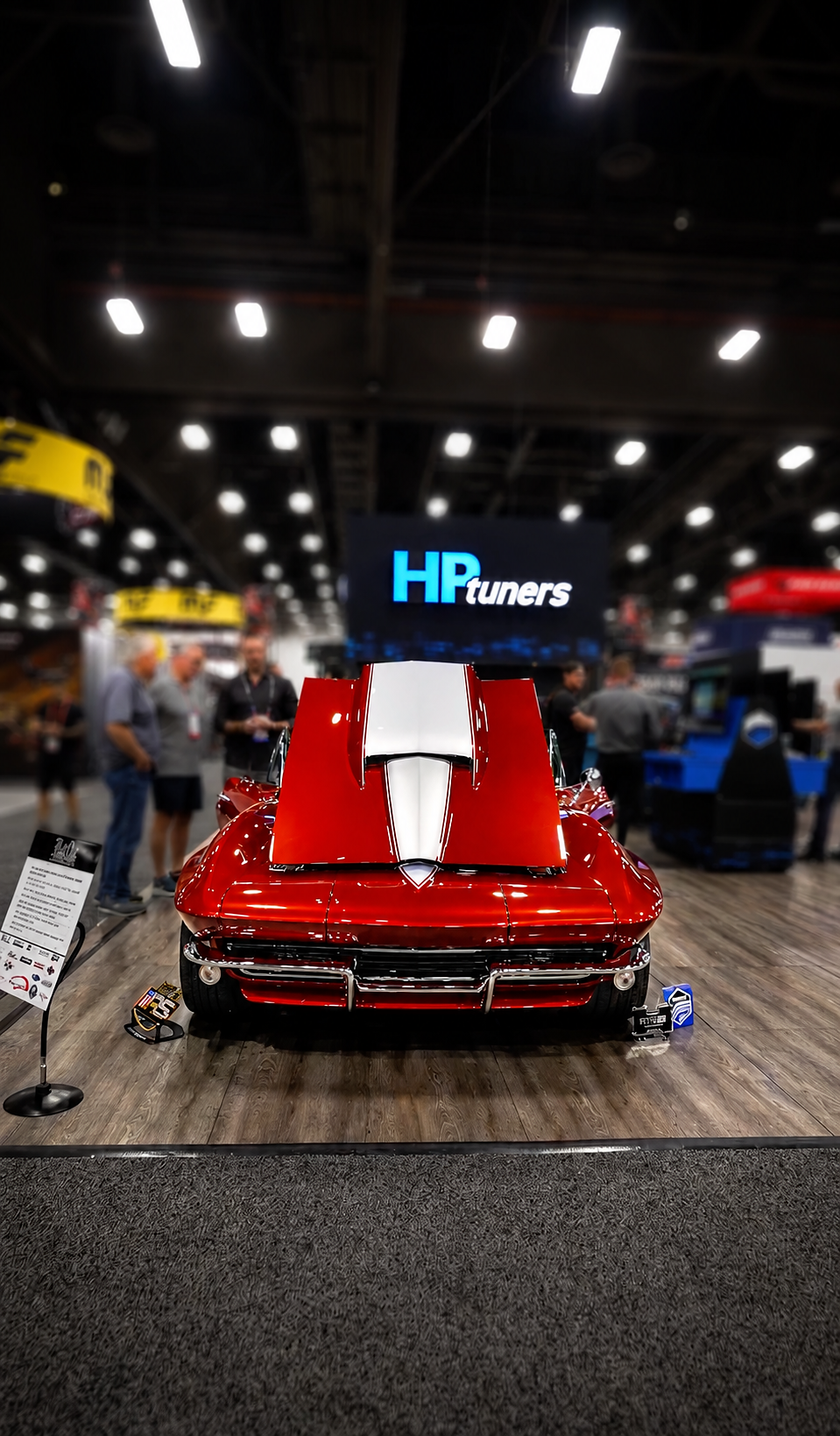 Rear view of red 1967 Corvette with open hood