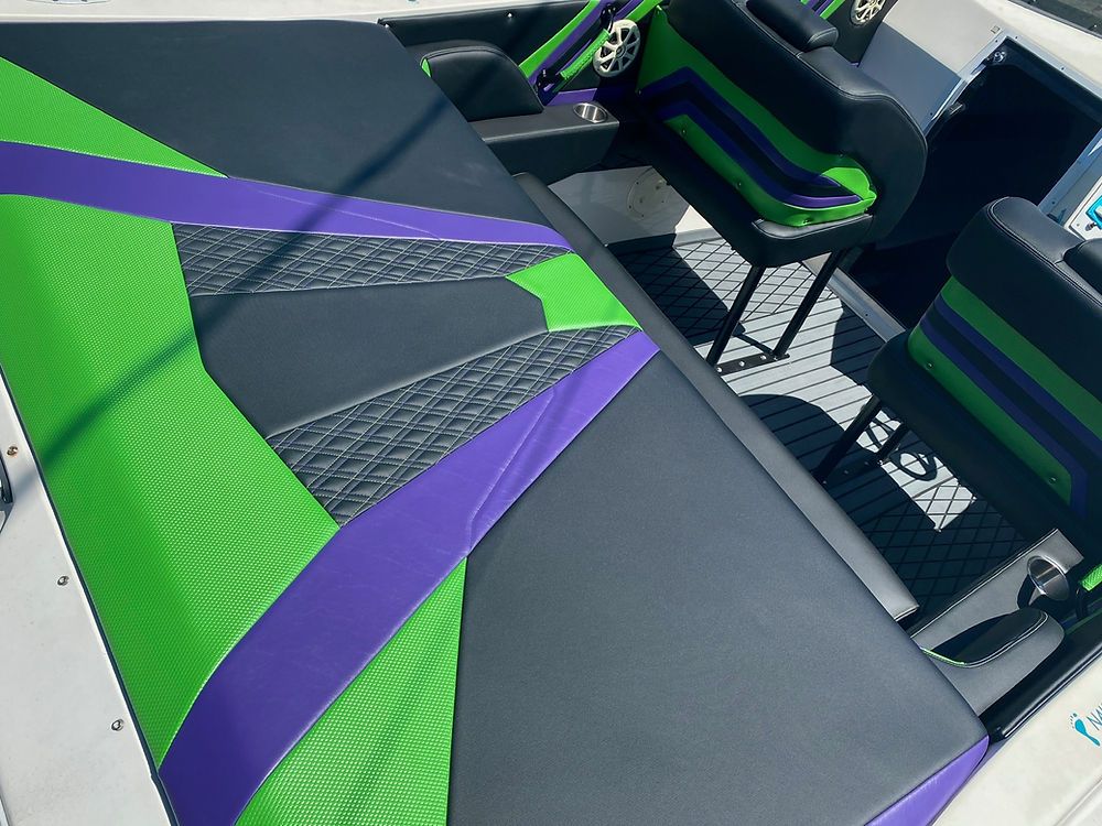 Marine boat interior with green and purple seats