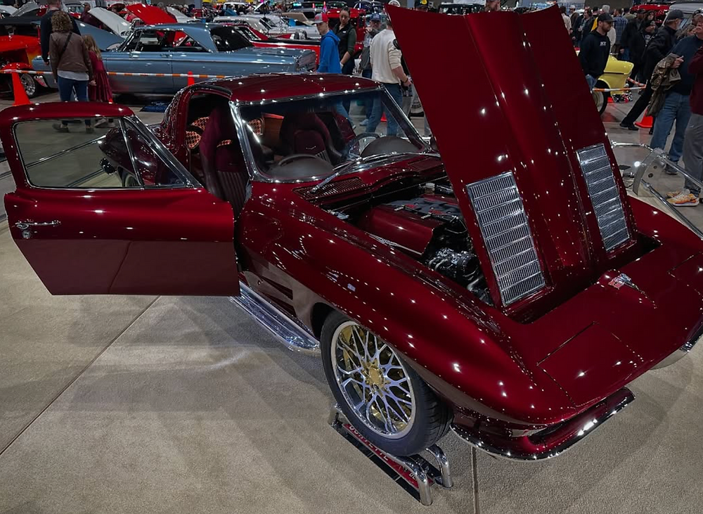 Dark red 1963 Split Window Corvette, door and hood open