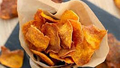 Histoire et évolution des chips : de la friteuse aux versions plus saines