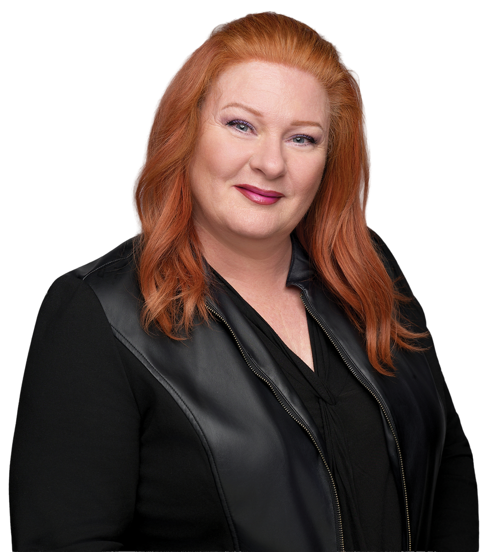 Portrait of Laurie Kozak Mynarski with red hair.