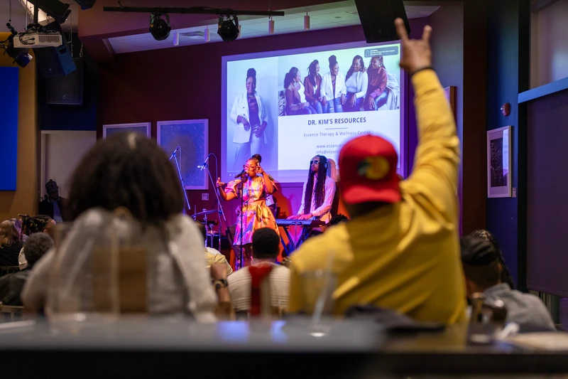 Independent artist live concert performance with packed house