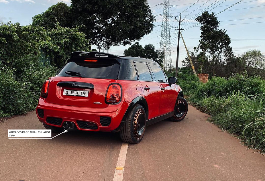 Modified Mini Cooper with Akrapovic cf dual exhaust tips