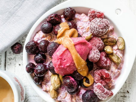 Overnight oats, with berries, "nice" cream and nut butter