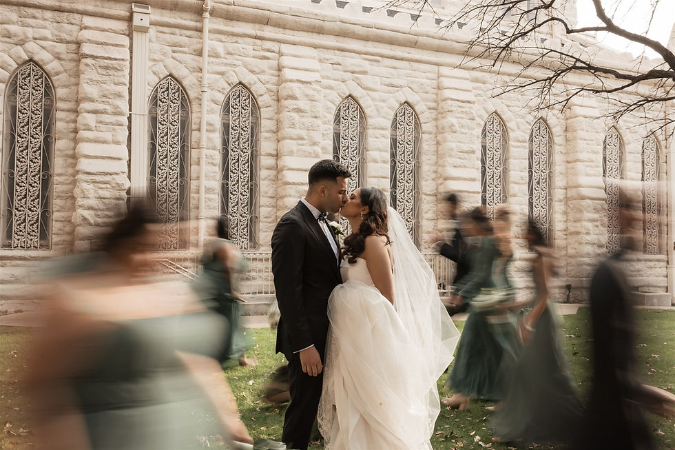 Bride and groom kissing outside of wedding in Dallas-Fort Worth coordinated by Virtuous Endeavors