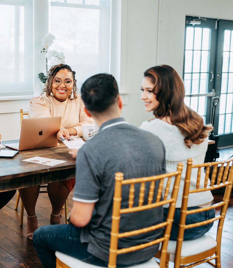 Wedding planner guiding engaged couple through budget tips to save money