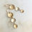 Thumbnail: 3 tiered mix metal gold and silver disc earrings