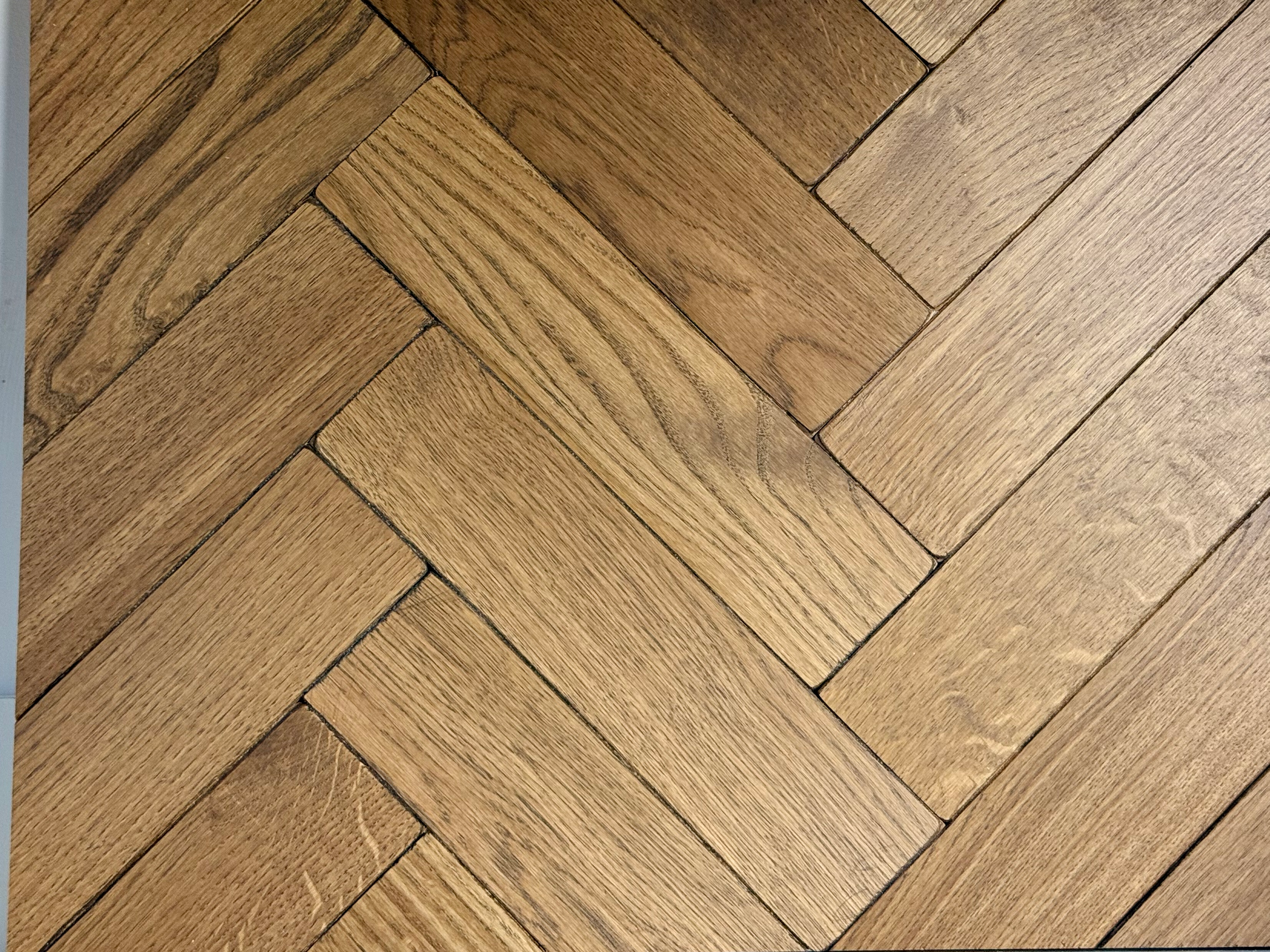 Traditional herringbone flooring vintage oak parquet.