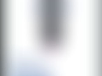 A business team seated around a boardroom table.