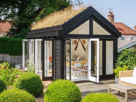 Orange Cottage grass roofed Summer House