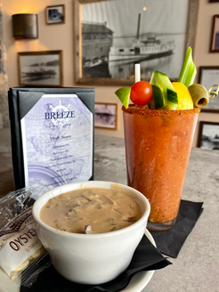 Cup of soup and Bloody Mary cocktail