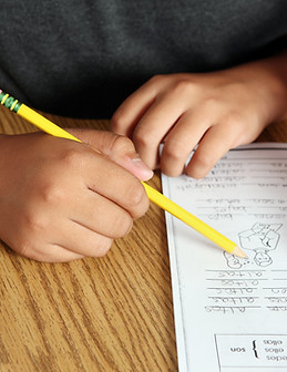 Teacher Helping Student