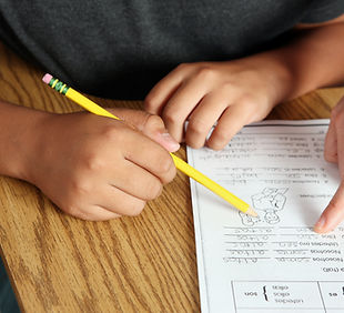 Teacher Helping Student