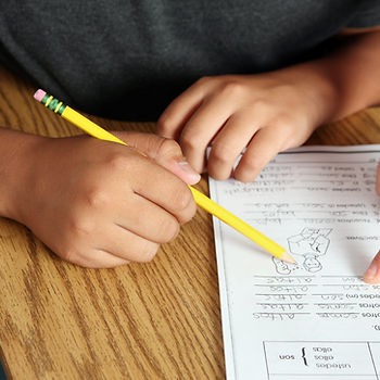 Dyslexic child writing