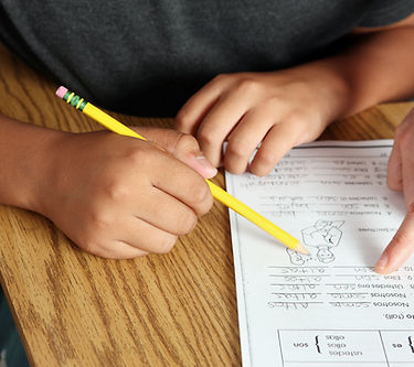 Teacher Helping Student
