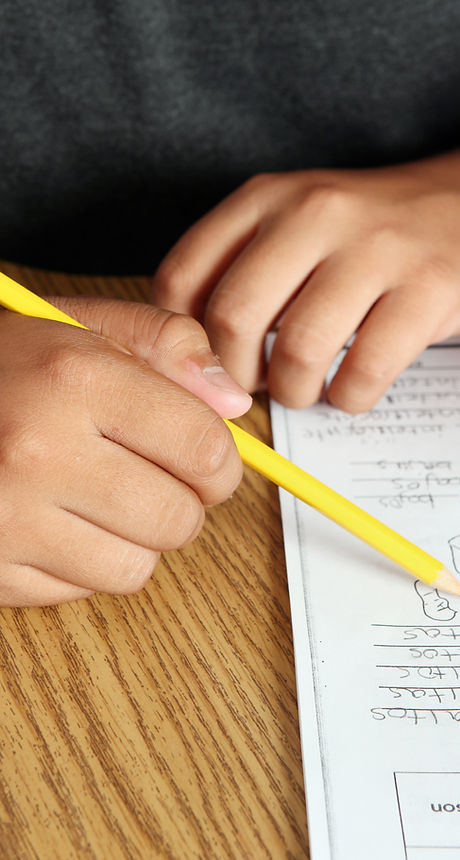 Teacher Helping Student