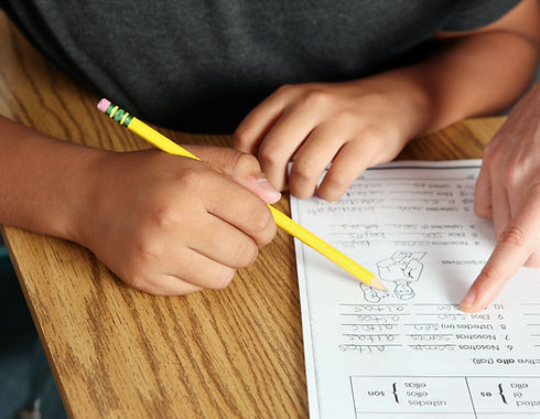 Teacher Helping Student