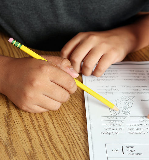 Teacher Helping Student