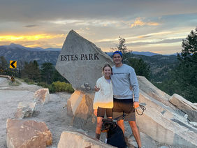 Man, woman, and dog at Estes Park, CO